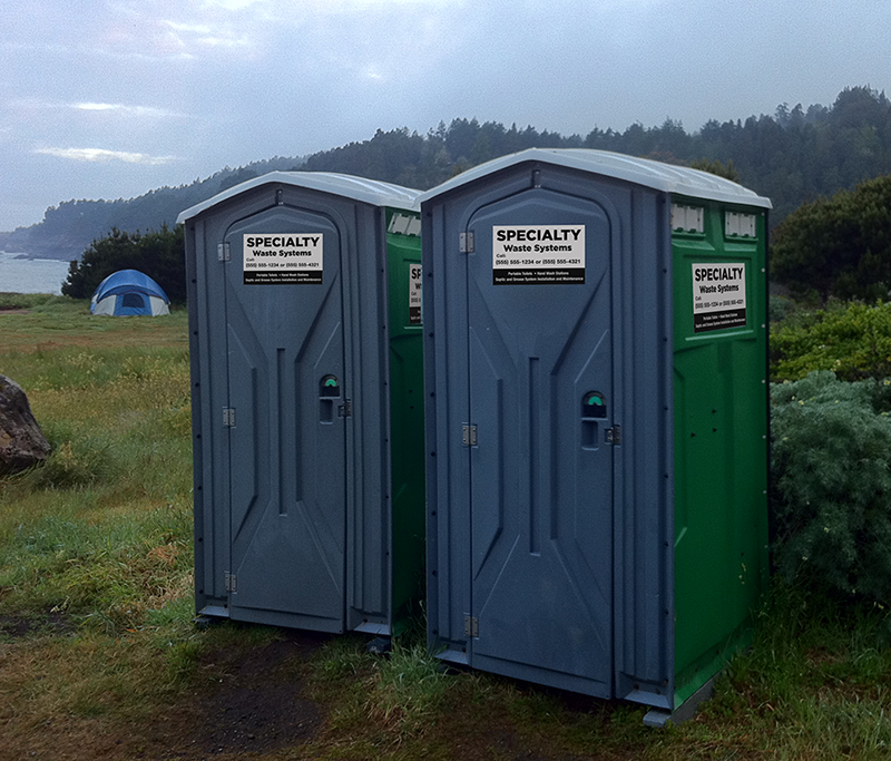 Porable Toilet labels displaying logo and infomation about company.